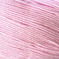 A close-up of light pink thread or yarn strands, showing the texture and color of the material.
