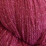 A close-up of twisted yarn in a heathered berry purple color with subtle pink and magenta undertones.