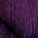 A close-up of deep purple yarn strands, showing the texture and color of the fiber.