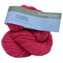 Two skeins of pink yarn with a Plymouth Select label on a white background