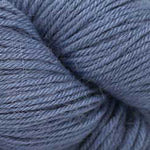 A close-up of a dusty slate blue or periwinkle-colored yarn, showing the texture of the twisted plies.