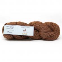 A skein of brown yarn with a white paper label that reads 'Ryazan Horsebred' on a white background.
