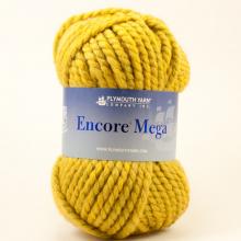 A skein of Plymouth Yarn Encore Mega yarn in a mustard yellow color, with its blue and white paper label visible in the center.