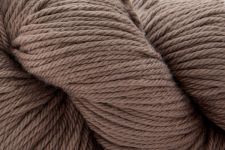 A close-up of a skein of taupe brown yarn, showing the twisted plies and soft, fuzzy texture of the fiber.
