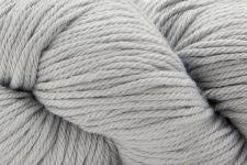 A close-up of light gray plied yarn, showing the texture and color of the fiber.