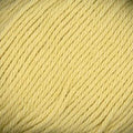 A close-up of pale yellow yarn strands, showing the texture and color of the fiber.