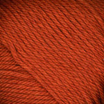 A close-up of bright orange yarn with visible twisted plies and soft texture.