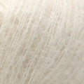 Close-up of light gray hair color swatch