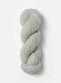 Gray skein of yarn on a white background
