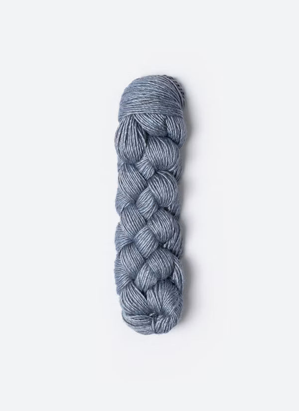 A single skein of heathered slate blue-gray yarn, styled in a braided braid, centered on a clean white background.