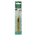 Gold crochet hook with packaging on a white background