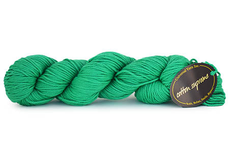 Green skein of yarn with a label on a white background