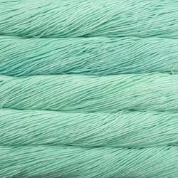 Close-up of teal yarn with a soft texture