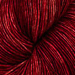 Close-up of red yarn with a textured surface