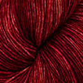Close-up of red yarn with a textured surface