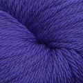 A close-up of a purple skein of yarn, showing the detailed texture of the twisted plies.