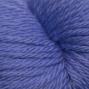 A close-up of textured yarn in a periwinkle blue color, showing the twisted ply structure of the thread.