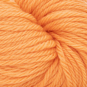 A close-up of bright orange yarn wound into a skein, showing the twisted plies and soft texture.