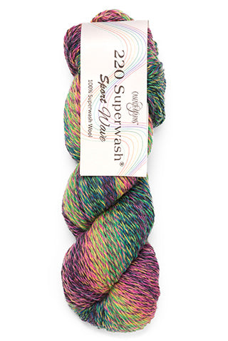 Multicolored skein of yarn with a label on a white background