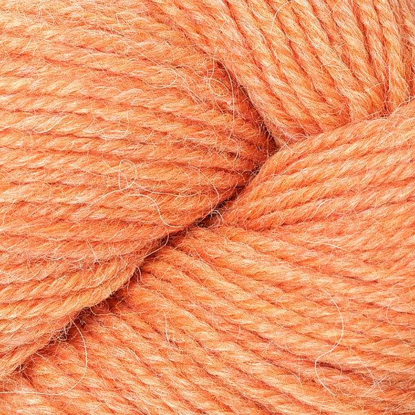 Close-up of a ball of orange yarn