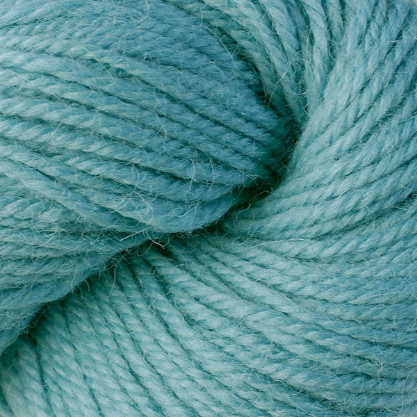 Close-up of a skein of teal yarn