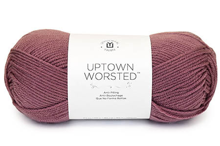 Ball of yarn labeled 'Uptown Worsted' on a white background