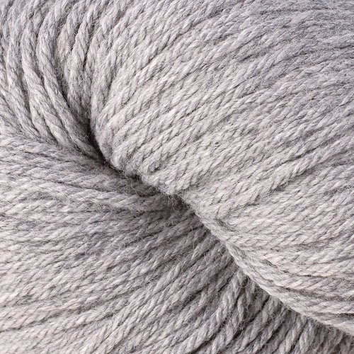 Close-up of gray yarn on a white background