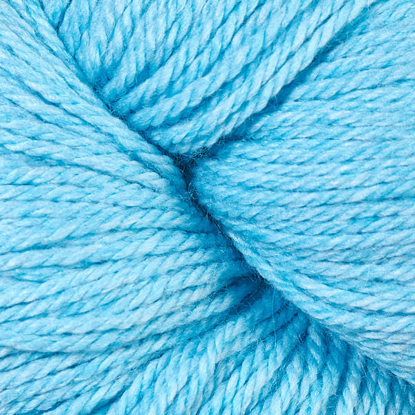 Close-up of a ball of bright blue yarn