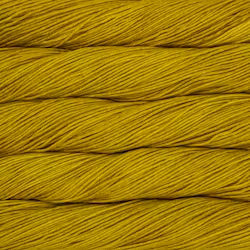 A close-up of tightly wound yarn or thread in a mustard yellow color, filling the entire frame.