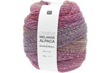 A single ball of Creative Alpaca Woolenball yarn in the 'Windsorhall' colorway, featuring a variegated pattern of pink, purple, and blue-gray tones with a white paper label.