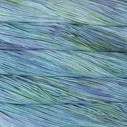 A close-up of variegated yarn strands in shades of blue, teal, green, and lavender-purple, filling the entire frame.