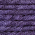Close-up of purple yarn with a textured surface