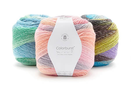 Three balls of multicolored yarn with a 'Colorburst' label on a white background