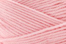 A close-up of light pink yarn strands wound together, showing the soft texture and color of the fiber.