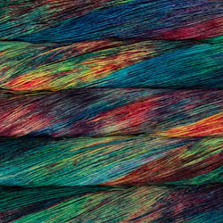 Close-up of colorful yarn strands or thread bundles layered horizontally, showing a marbled mix of teal, blue, green, red, orange, and purple tones.