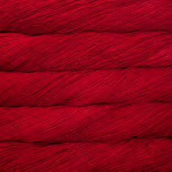 A close-up texture shot of deep red yarn, showing the twisted strands and soft sheen of the fiber.