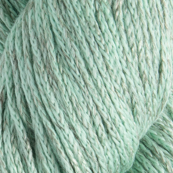 Close-up of light green yarn with subtle variations
