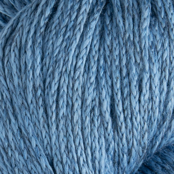 Close-up of blue yarn with a textured pattern