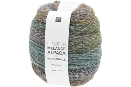 Multicolored alpaca yarn ball with a label on a white background