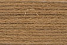 A close-up of a brown textured material, likely thread or yarn, filling the entire frame.