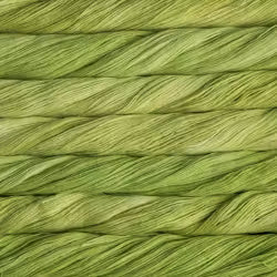 Close-up of green yarn with a braided pattern