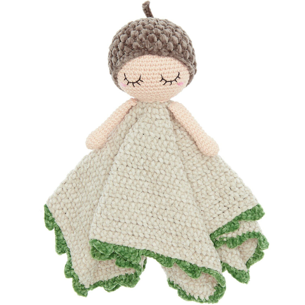Knitted doll with acorn hat and green trim on a white background