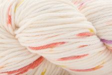 A close-up of a skein of variegated yarn with a cream base and pastel stripes of pink, orange, yellow, and purple.
