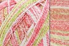 Close-up of pink and green yarn with a textured pattern