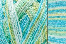 Close-up of blue and green yarn with a detailed texture pattern.