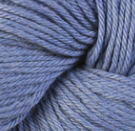 A close-up of soft, twisted yarn in a dusty periwinkle blue color, filling the entire frame.