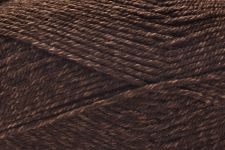 A close-up of dark brown yarn strands, showing the texture and color of the fiber.