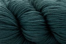 A close-up of dark teal blue-gray yarn, showing the texture and color of the twisted fibers.