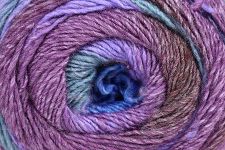A close-up of a coiled skein of variegated yarn with blended purple, pink, blue, and green tones.