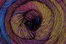 Close-up of a ball of multicolored yarn with purple, blue, and yellow hues.